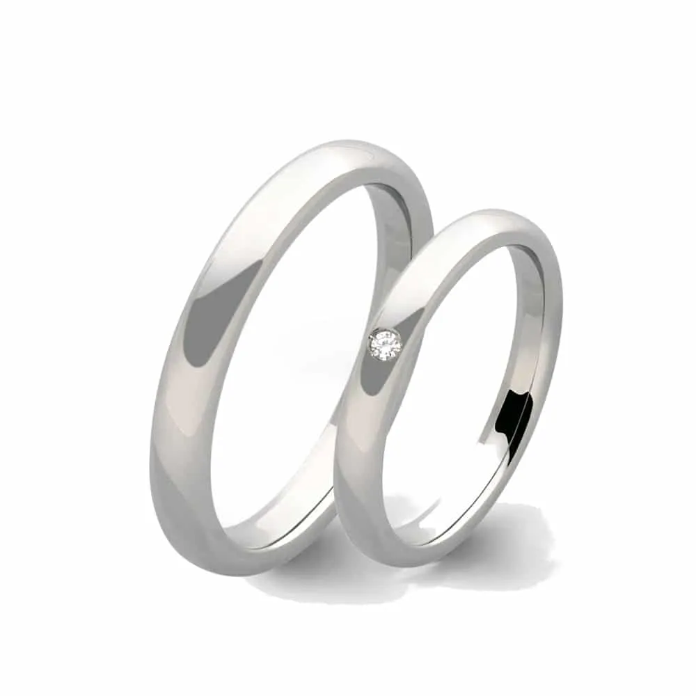 Coppia di fedi in oro bianco 9 carati con diamante